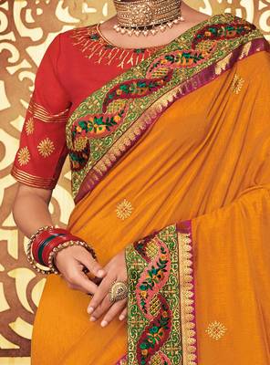 Orange embroidered silk saree with blouse 4