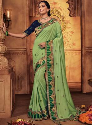 Green embroidered silk saree with blouse 1