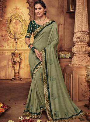 Green embroidered silk saree with blouse 1