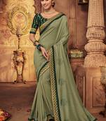 Green embroidered silk saree with blouse