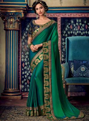 Dark parrot green woven silk saree with blouse 1
