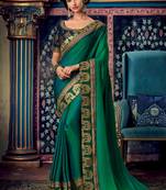 Dark parrot green woven silk saree with blouse