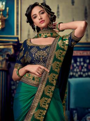 Dark parrot green woven silk saree with blouse 2