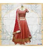 The gorgeous Lehenga is made in silk with handwork of gota pati and nalki work on the dupatta