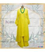 This gorgeous dress has a banarasi kurta with a chinon jacket on top of it. Tge look is completed with a chinon plazzo