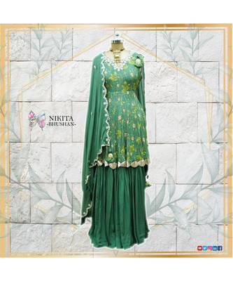This beautiful sharara suit with peplum top is made with fusion of print and handwork of pitta, sippi and nalki 1