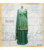 This beautiful sharara suit with peplum top is made with fusion of print and handwork of pitta, sippi and nalki