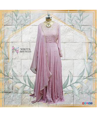 This beautiful dress made on chinon, is a anarkali with authentic and elegant hand embroidery done all over the dress 1