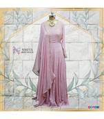 This beautiful dress made on chinon, is a anarkali with authentic and elegant hand embroidery done all over the dress