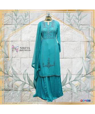 The gorgeous dress is made in a eautiful shade of blue on chinon cloth 1
