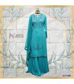 The gorgeous dress is made in a eautiful shade of blue on chinon cloth