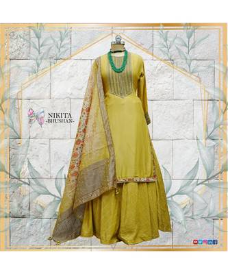 The gorgeous dress is made on chanderi with antique handwork on the kurta and chanderi skirt. 1