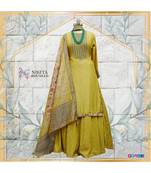 The gorgeous dress is made on chanderi with antique handwork on the kurta and chanderi skirt.