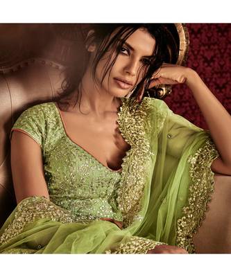 Peach embroidered Net bridal-lehengas 4
