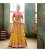 Yellow embroidered Net bridal-lehengas