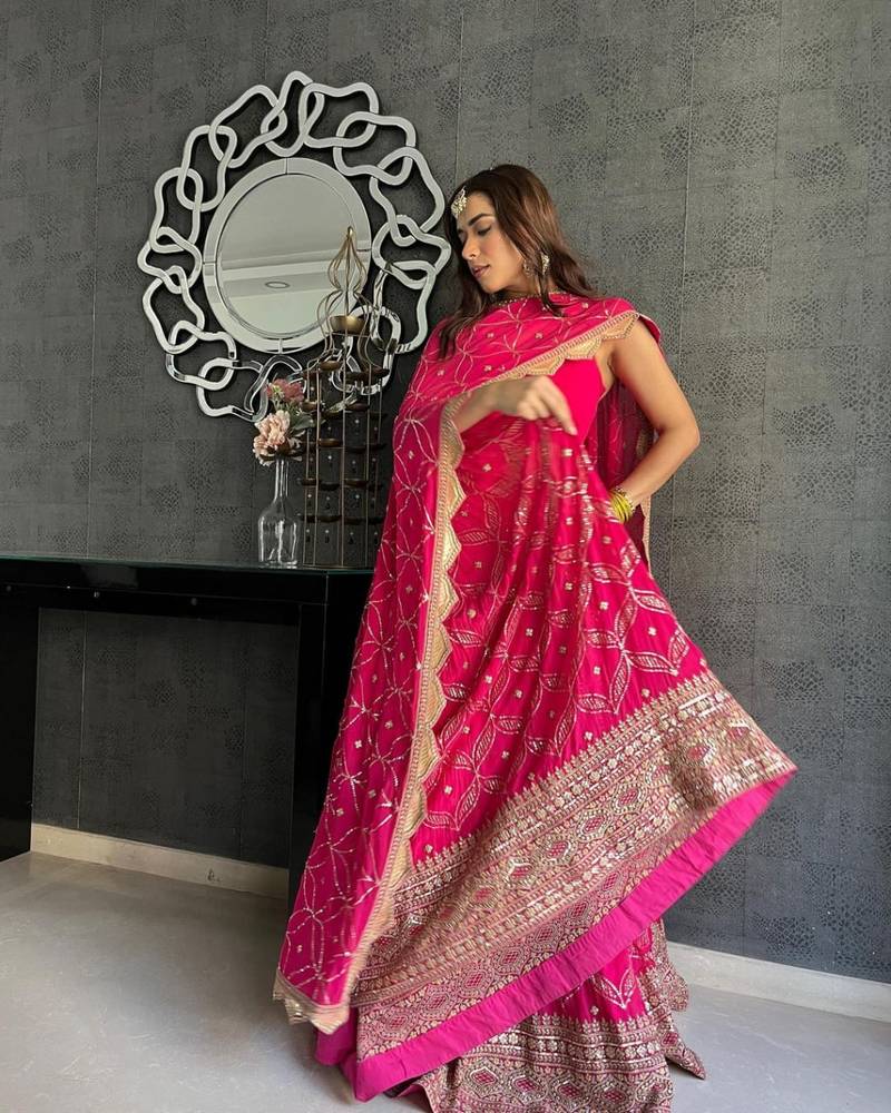 Dark Pink Zari and Sequins Embroidered georgette semi stitched lehenga choli