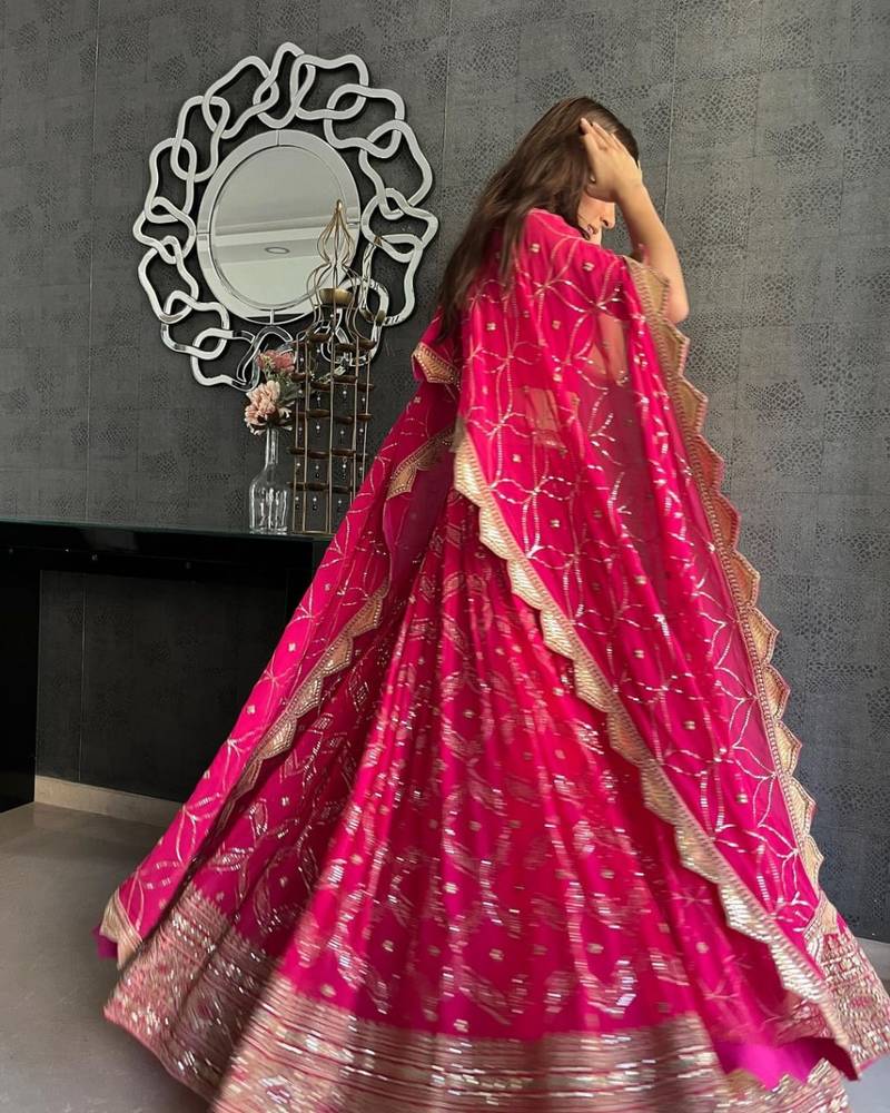 Dark Pink Zari and Sequins Embroidered georgette semi stitched lehenga choli