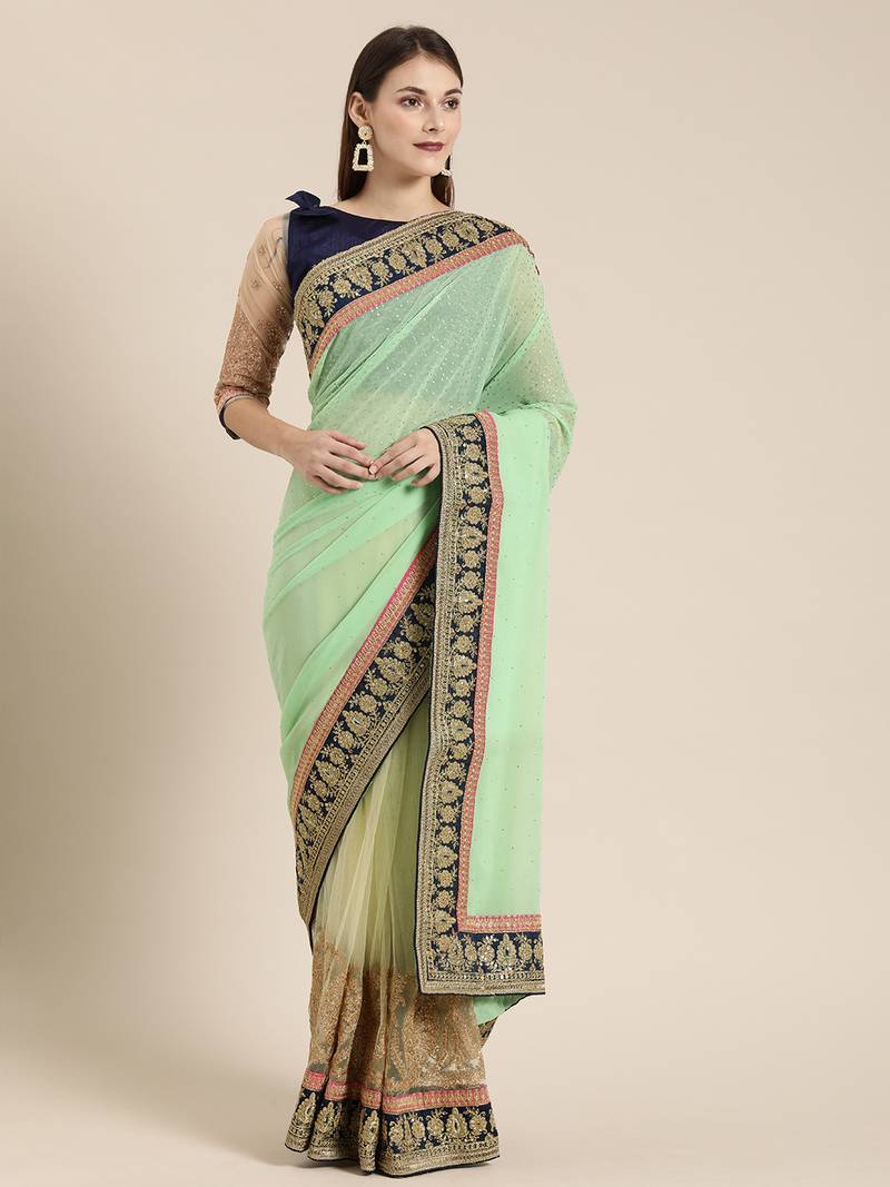 Turquoise woven Georgette saree with blouse