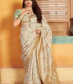 White woven silk blend saree with blouse