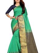 green woven banarasi saree with blouse