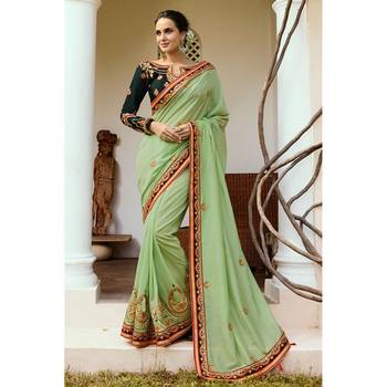   light green embroidered georgette saree with blouse 1