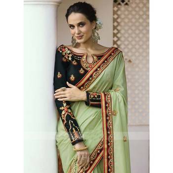   light green embroidered georgette saree with blouse 2