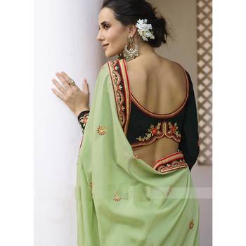   light green embroidered georgette saree with blouse 3