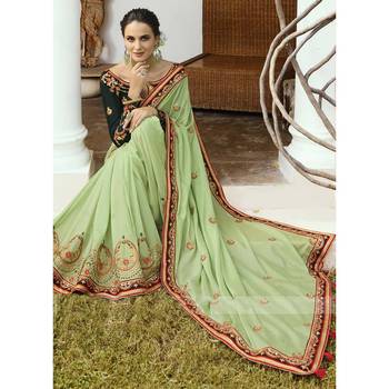   light green embroidered georgette saree with blouse 4