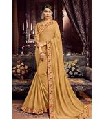 Dark chiku embroidered georgette saree with blouse