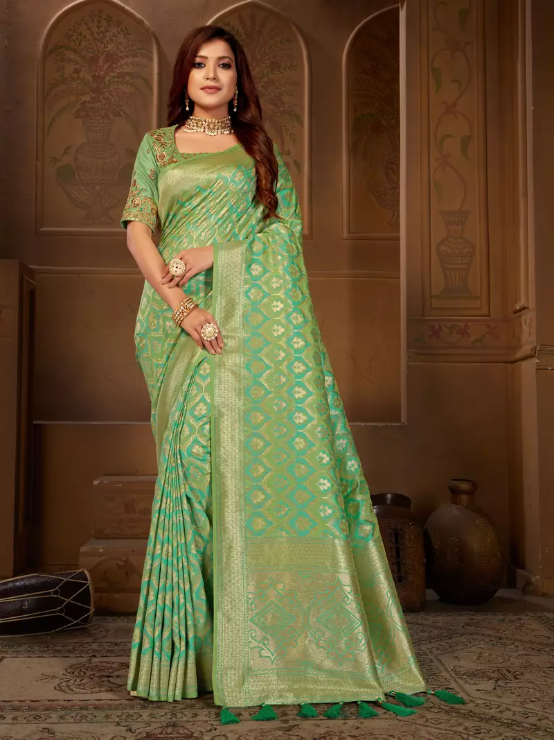 Green woven silk blend saree with blouse