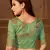 Green woven silk blend saree with blouse