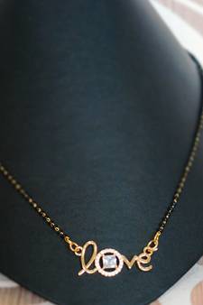 White stone studded Love pendent mangalsutra