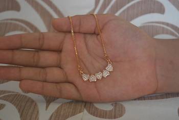 Heart shape white stone studded pendent with chain 1