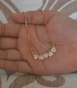 Heart shape white stone studded pendent with chain