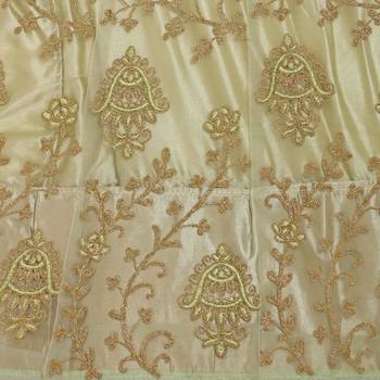 Beige embroidered net semi stitched lehenga 4