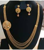 Georgeous gold plated step by step necklace set