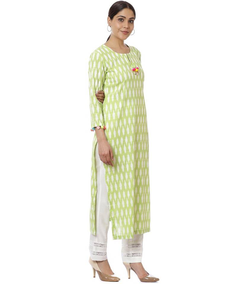 Green Ikkat Kurti with Off-White Crochet Pants