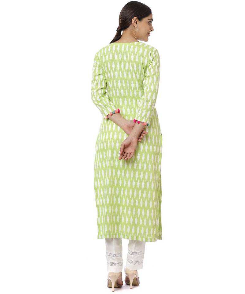 Green Ikkat Kurti with Off-White Crochet Pants