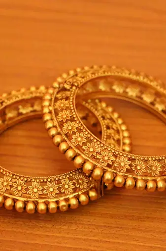 Gold bangles-and-bracelets