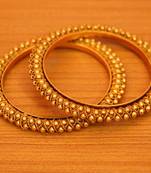 Gold bangles-and-bracelets
