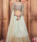 Sky-blue embroidered net semi stitched lehenga