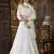 Off-white thread and Sequins embroidered georgette semi stitched lehenga