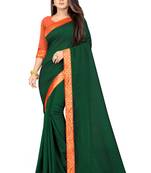 Green plain silk saree with blouse