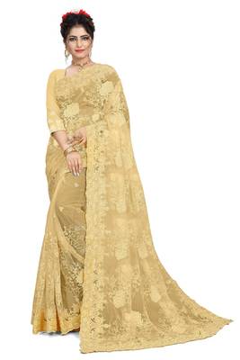 Cream embroidered net saree with blouse 1