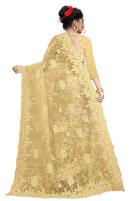 Cream embroidered net saree with blouse 3