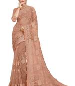 Beige embroidered net saree with blouse