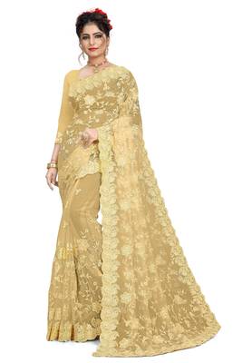 Cream embroidered net saree with blouse 1
