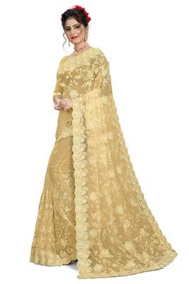 Cream embroidered net saree with blouse 2