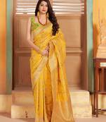 Yellow woven banarasi silk saree with blouse