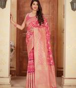 Pink woven banarasi silk saree with blouse